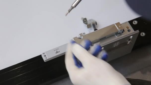 Mans hands tighten screw during assembling furniture doors system. Close up view. — 비디오