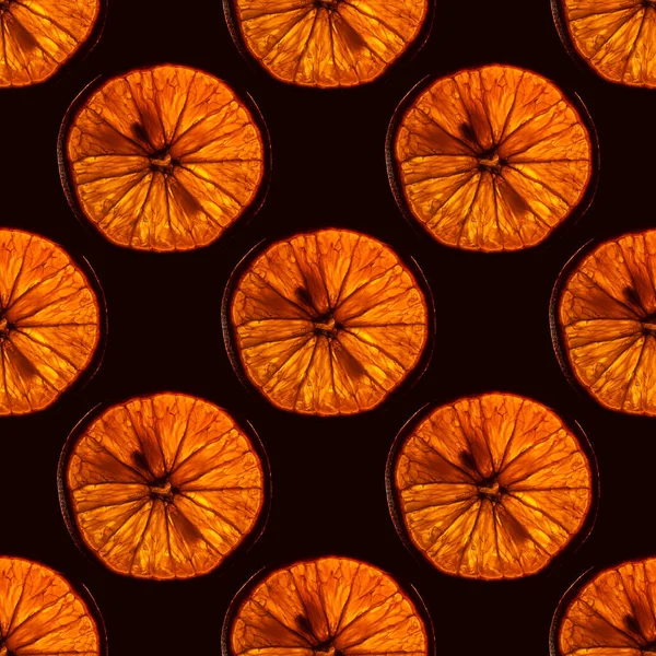 seamless pattern of slice orange fruit with backlight isolated on black background, can be tiled