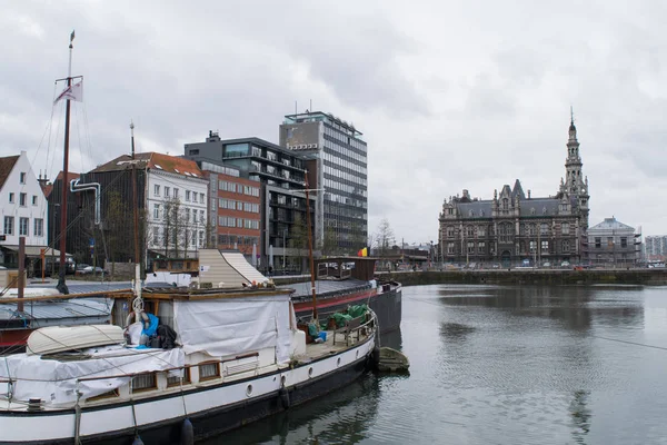 Boats and buildings of the docks in Antwerp, Belgium