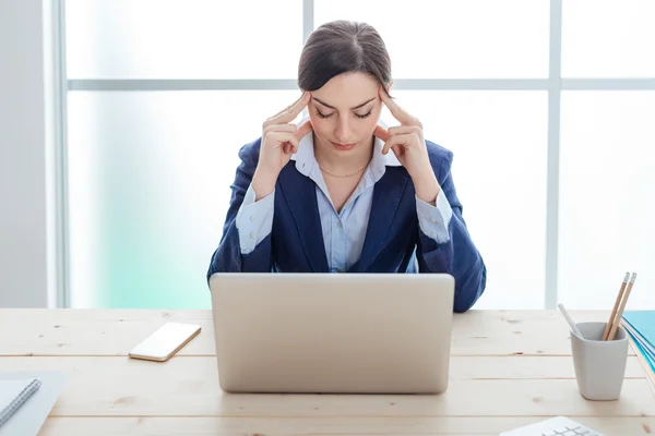 Exhausted businesswoman at work — Stock Photo, Image