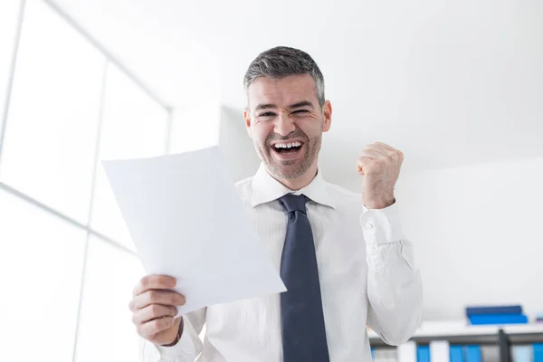 Cheerful businessman receiving good news — Stock Photo, Image