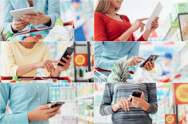 Mensen met behulp van tabletten en smartphones — Stockfoto