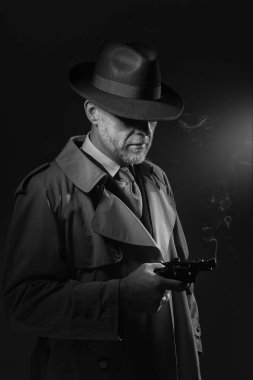 Detective holding gun