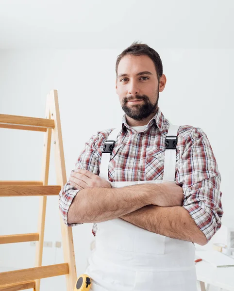 Painter posing with arms crossed — Stock Image Painter posing with arms crossed Royalty Free Stock Photos