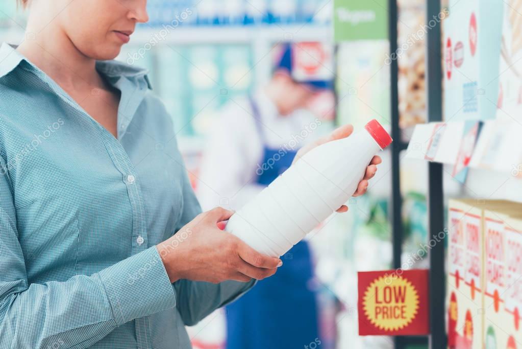 Woman reading food labels