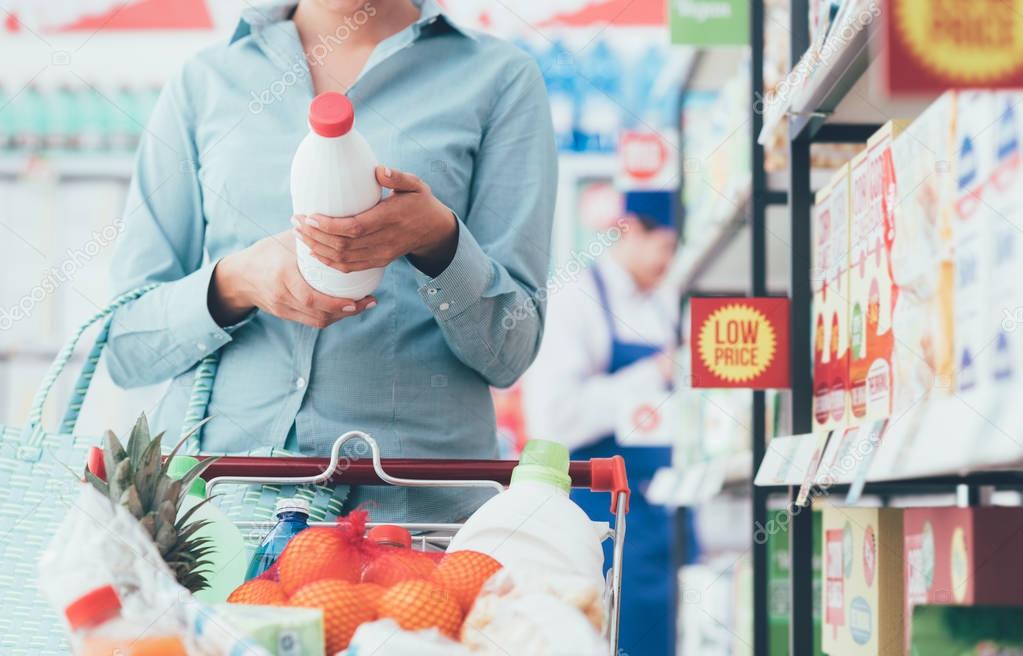 Woman reading food labels