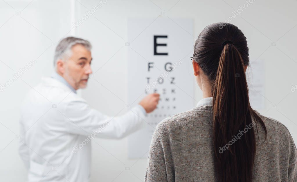 oculist examining patient