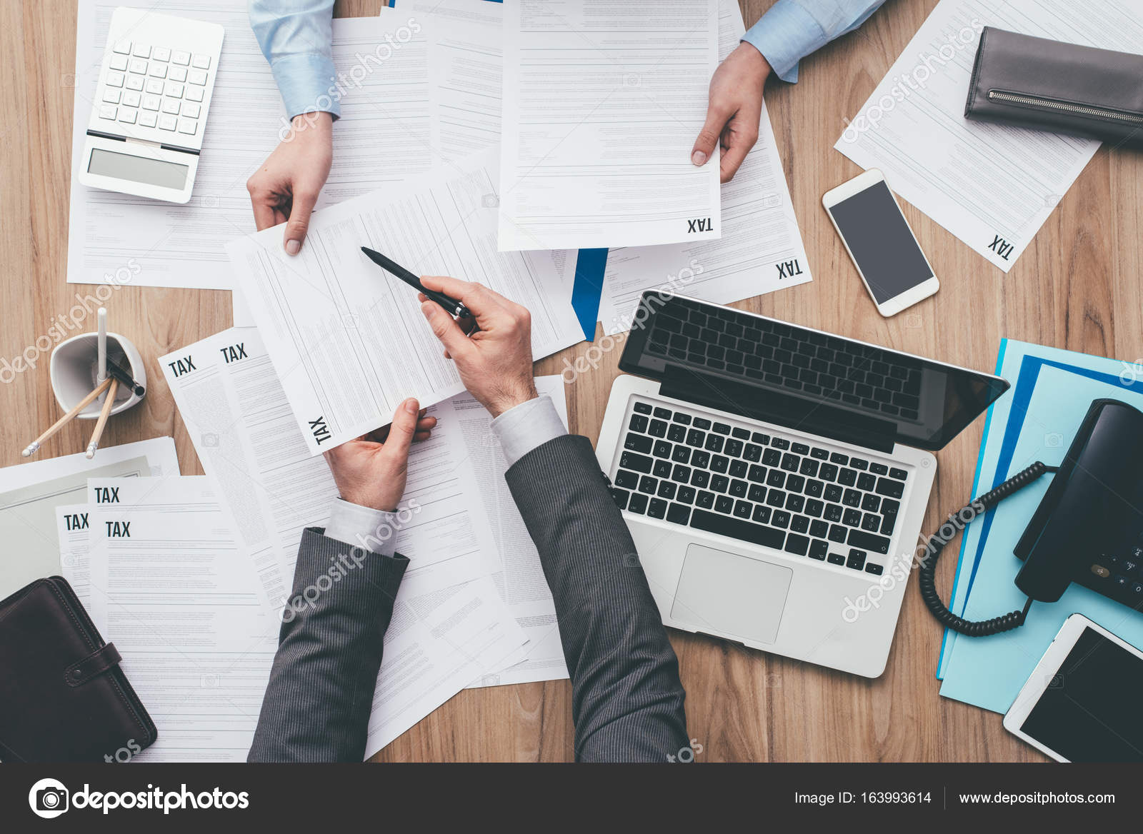 Business People Working At Office Desk Stock Photo C Stokkete