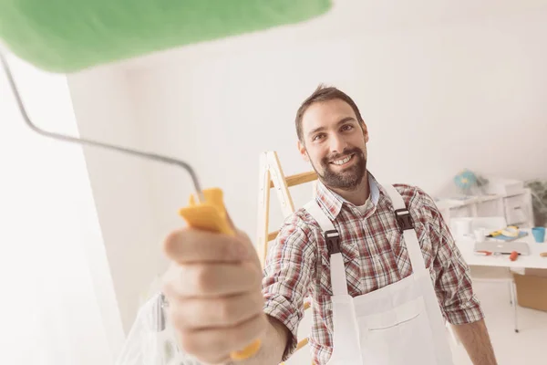Smiling professional painter working — Stock Image Smiling professional painter working Stock Picture