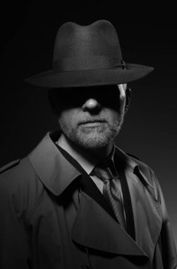 Man posing in fedora hat 