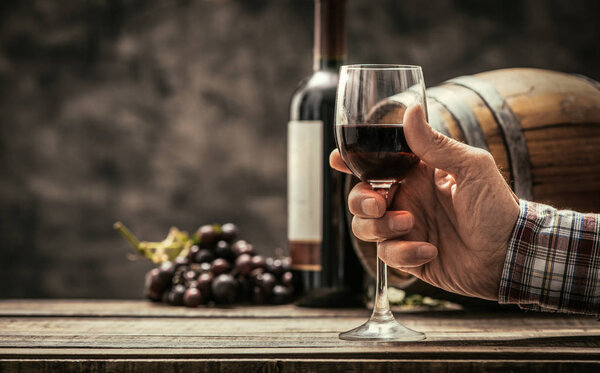 wine maker tasting red wine