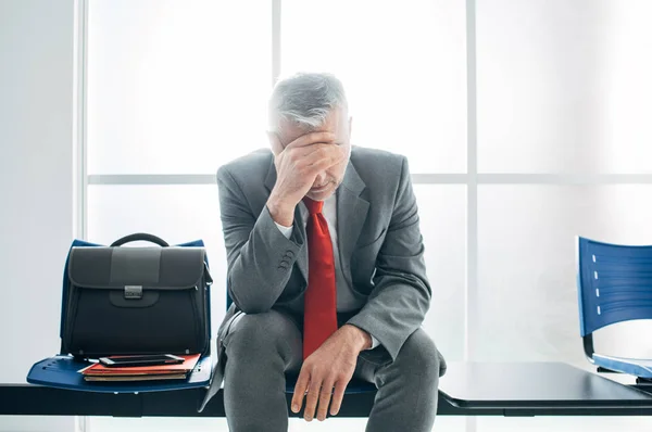 Depressed stressed businessman Stock Image