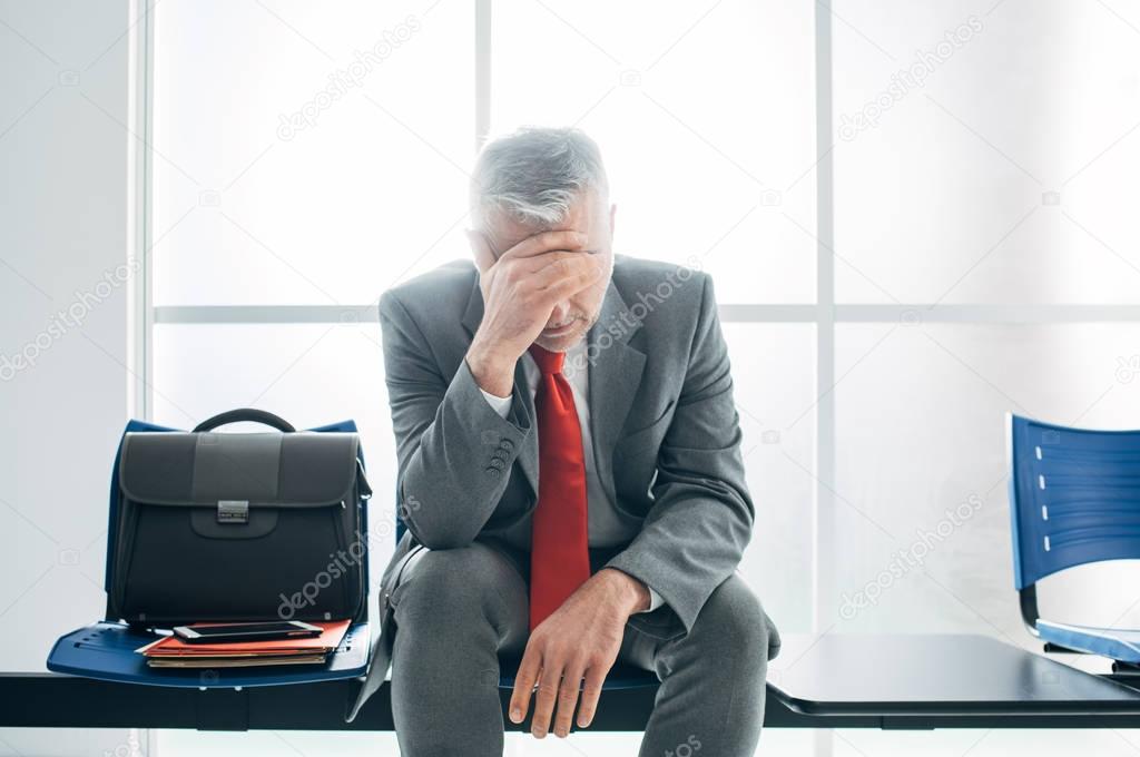 Depressed stressed businessman