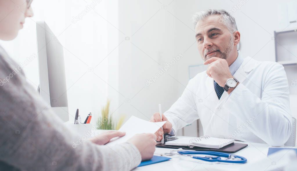 doctor meeting with patient in office
