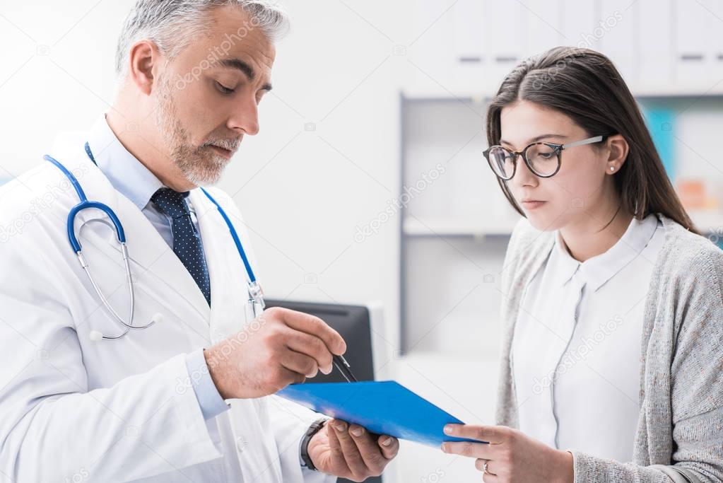 Doctor explaining medical test results to the patient