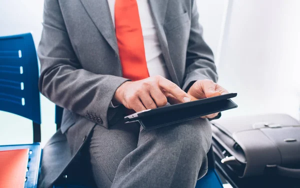 Businessman connecting with tablet