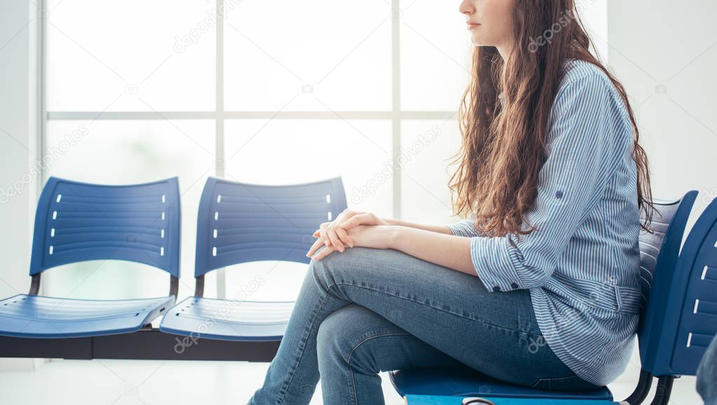 Young woman in waiting room