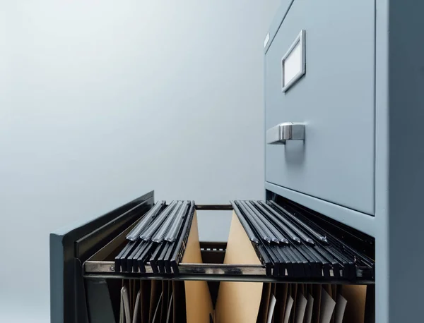 Filing cabinet with open drawer — Stock Photo, Image