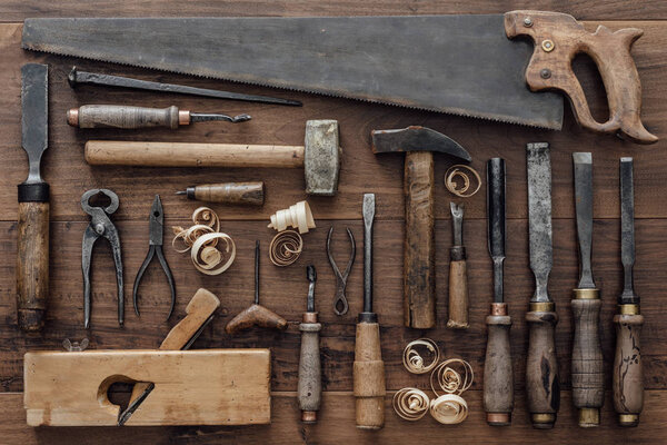Vintage woodworking tools on workbench