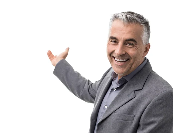 Businessman showing blank copy space — Stock Photo, Image