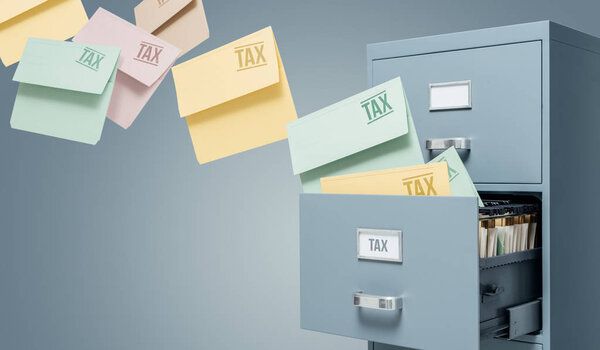 Tax files transferring into filing cabinet