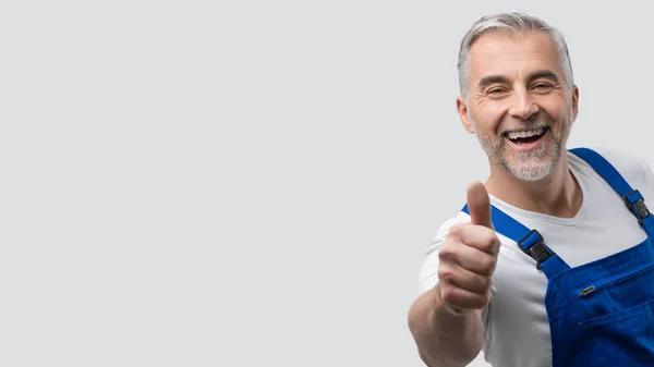 Plumber giving thumbs up — Stock Photo, Image