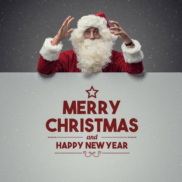 Santa Claus wishing merry Christmas