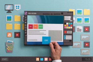 Web tasarımcısı Web şablonları ve bir profesyonel yazılım, kolaj ve kağıt kullanarak web sayfası düzenleri hazırlanması kompozisyon kesmek