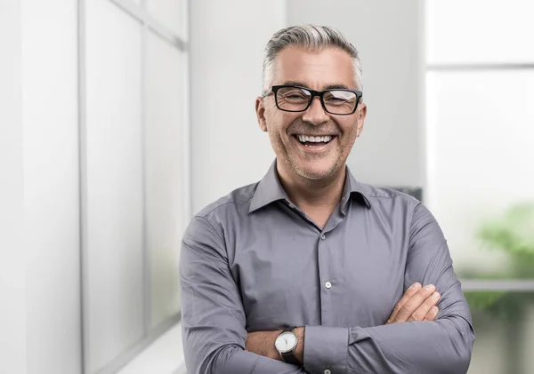 Confident Businessman Posing Office Arms Crossed Smiling Camera — Stock Photo, Image