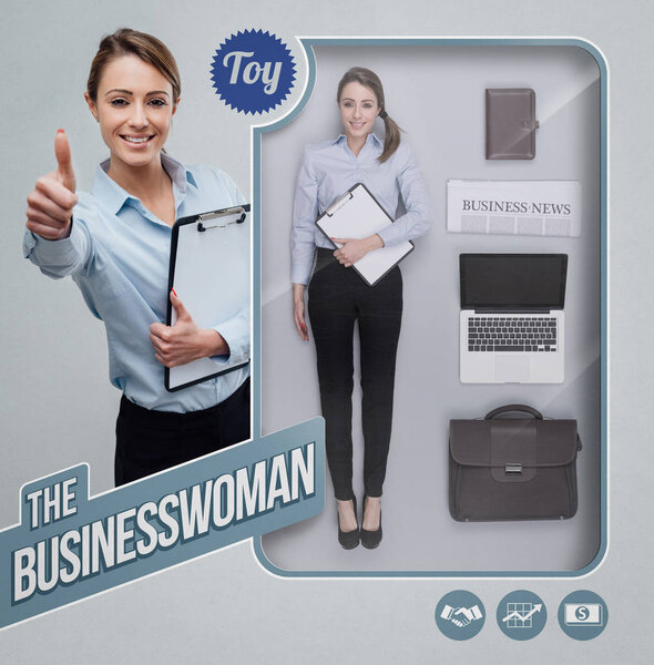 Businesswoman lifelike doll with toy see through packaging, accessories and smiling character giving a thumbs up