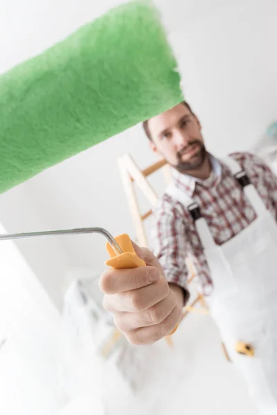 Professional painter working and painting — Stock Photo, Image
