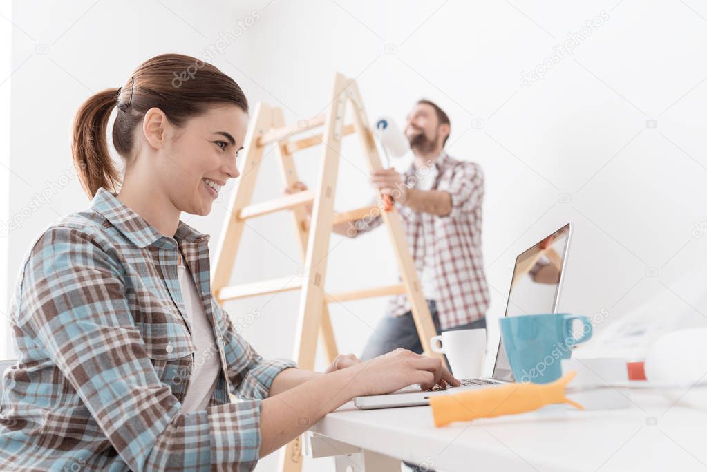 Young couple remodeling house apartment