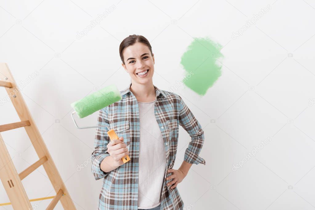 Young woman renovating house