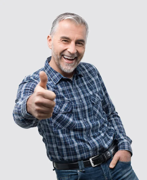 Mature man giving thumb up — Stock Photo, Image