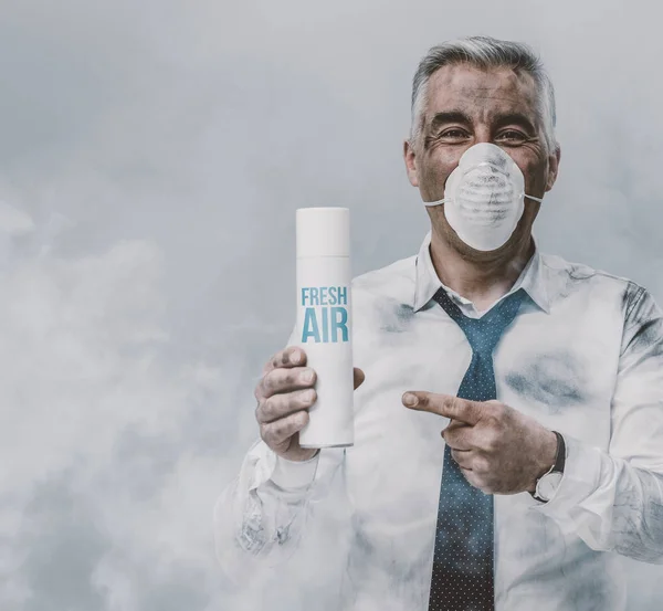 Businessman advertising spray air purifier — Stock Photo, Image