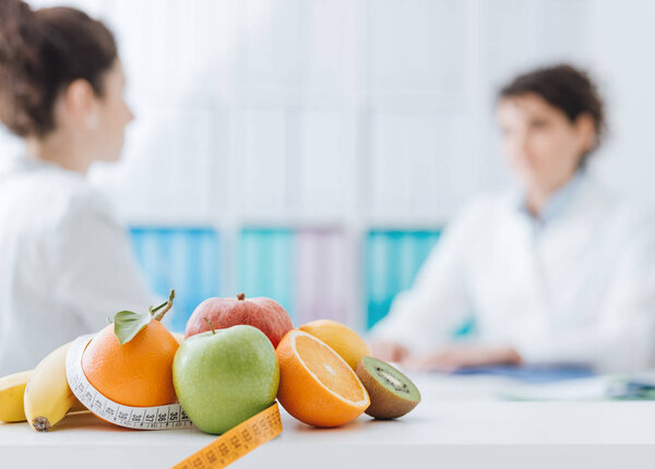 Professional nutritionist meeting patient