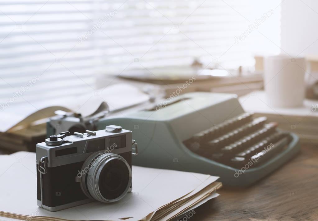 Writer, journalist and photoreporter vintage desktop with typewriter, camera and record player