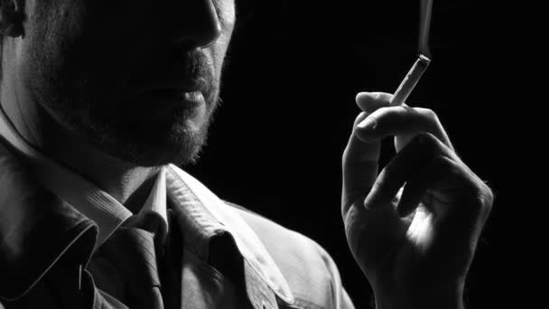 Confident Noir Detective Smoking Cigarette Turns Looks Camera — Stock Video