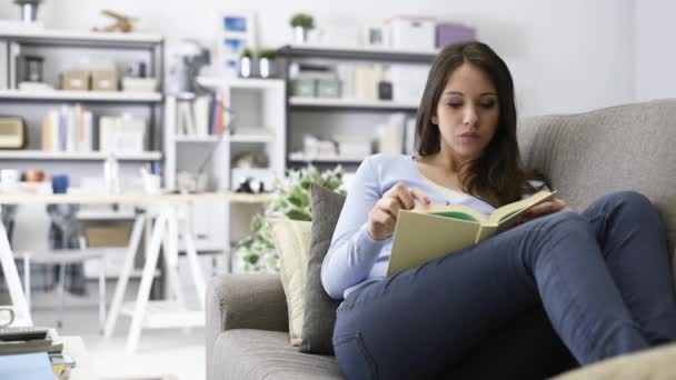 Young Attractive Woman Relaxing Home She Lying Sofa Reading Book — Stock Video