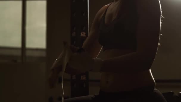 Woman preparing for a boxing workout — Stock Video