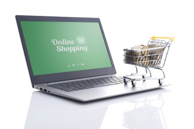 Alışveriş sepeti dolu para ve dizüstü