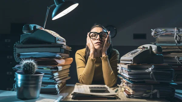 Exhausted businesswoman working late at night — Stock Image Exhausted businesswoman working late at night Stock Photo