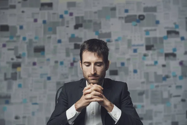 Corporate manager thinking and looking down — Stock Photo, Image