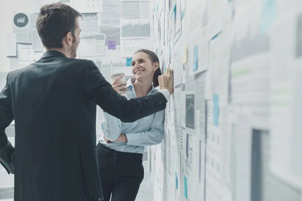 Colleagues flirting during a coffee break — Stock Photo, Image