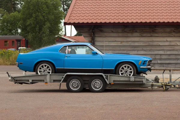 Car on a flatbed truck. Auto carrier trailer. — Stock Photo, Image