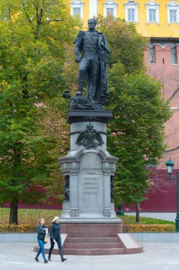Moscow, Russia - October 14, 2019: Monument to Alexander I in Alexander Garden against Moscow Kremlin in autumn. Alexander I was Russian Tsar.