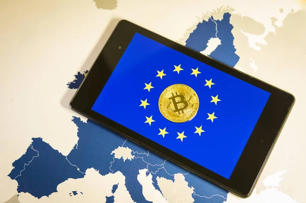 Financial concept with golden Bitcoin over smartphone, EU flag and map. — Stock Photo, Image