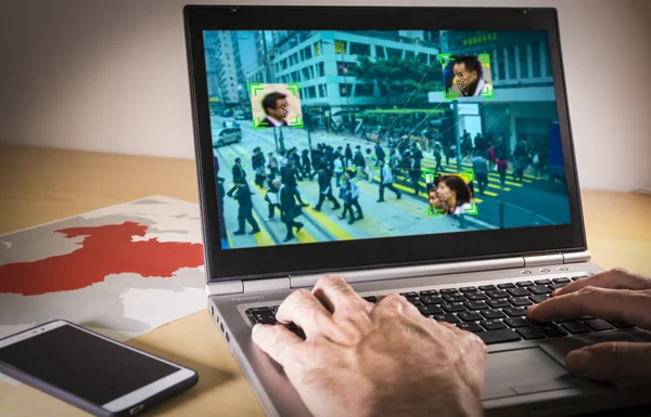 Laptop with street image and facial recognition in China — Stock Photo, Image
