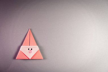 Mavi arka planda Origami Xmas Noel Baba