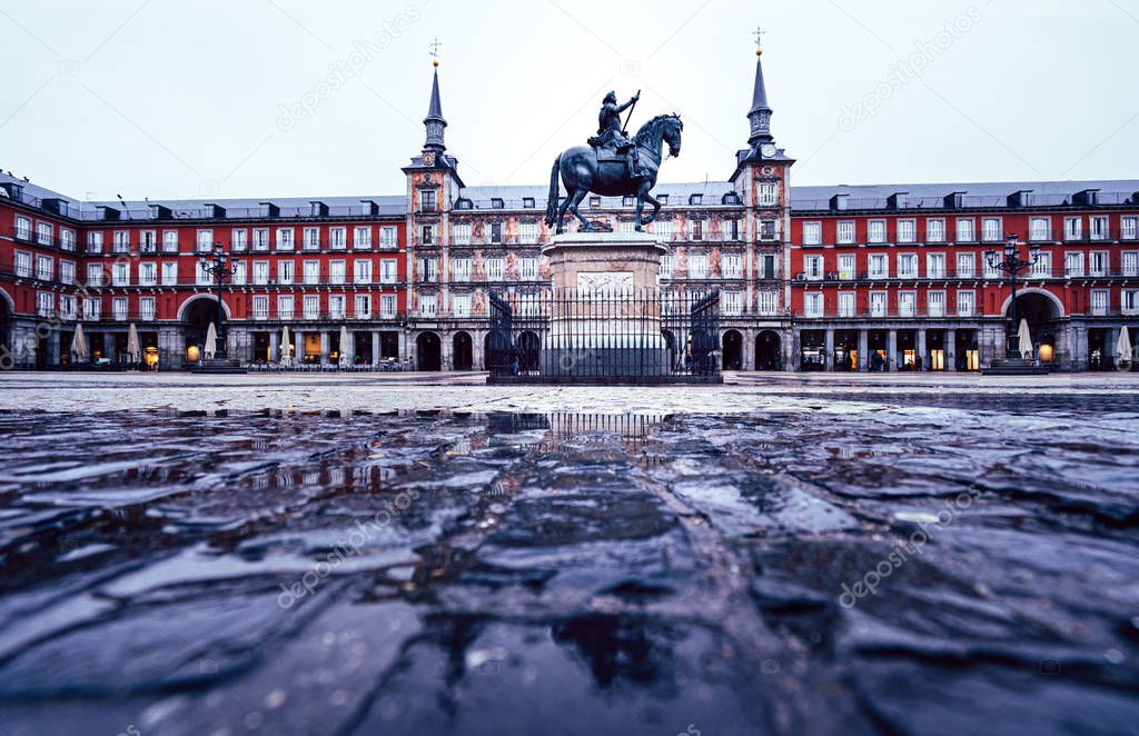 Plaza Mayor of Madrid after the storm, reflected on the ground